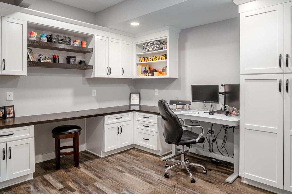 Private Office In A Basement With White Painted Ceiling And Walls