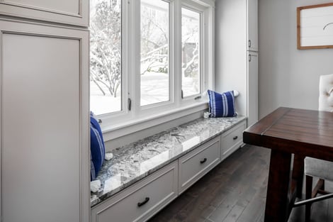 Whole Home Remodel Dining Area Oversized Window with Custom Built-In Window Bench Seating | Compelling Homes