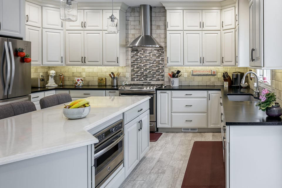 Porcelain floors in a push furnished kitchen with wide counter tops