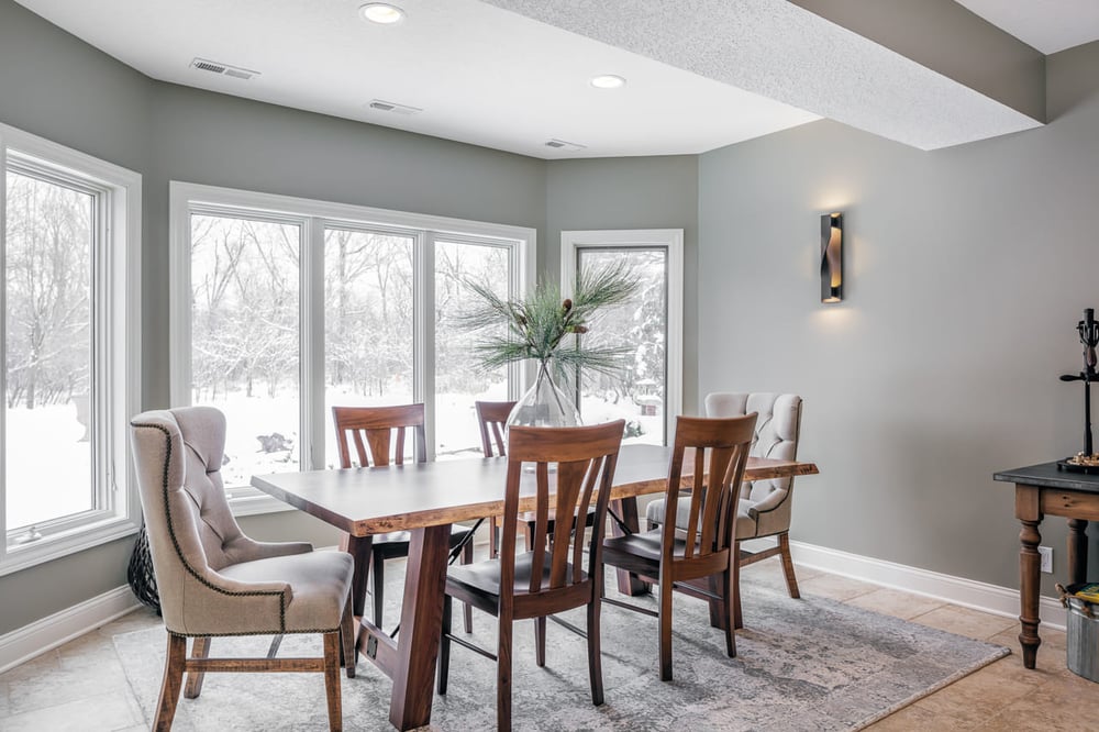 Dining Area in Walk Out Basement With Large Windows and Natural Light Featuring Heated Radiant Flooring | Compelling Homes Des Moines, IA