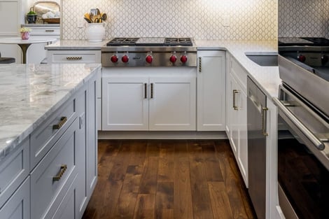 Arabesque Kitchen Backsplash and Rose Gold Hardware Details with Professional  Grade Appliances and Quartzite Countertops in Kitchen Remodel | Compelling Homes Design-Build Experts in Des Moines, IA