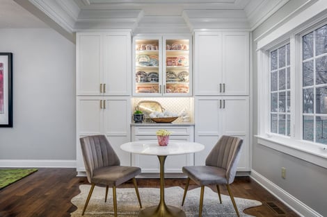 Sitting Room Off of Kitchen Remodel with Hand Crafted Unique Crown Molding Design on Ceiling and Custom Built In Cabinets | Compelling Homes Design-Build Experts in Des Moines, IA