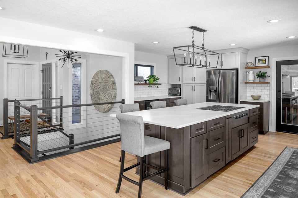 A Kitchen counter installed on the upper floor with large ceiling lights