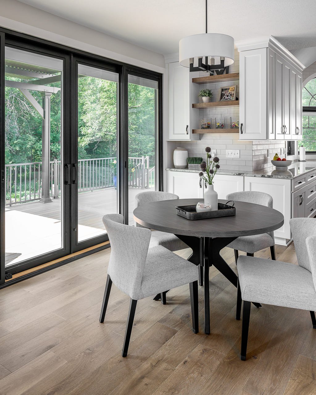 Dining area view with sliding Deck doors | Compelling Homes